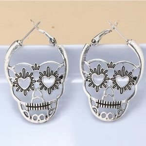 CUTE Cut out skull earrings. Antique Silver Halloween goth